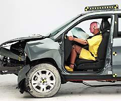 The dummy's position in relation to the steering wheel and instrument panel after the crash test indicates that the driver's survival space was maintained well