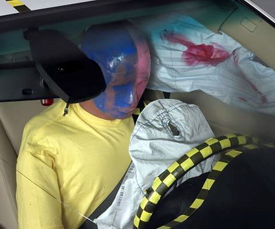 Smeared greasepaint indicates where the dummy's head contacted the side curtain airbag during rebound