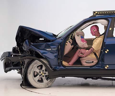 The dummy's position in relation to the steering wheel and instrument panel after the crash test indicates that the driver's survival space was maintained very well