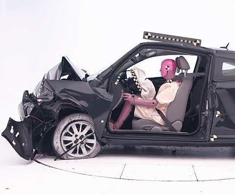 The dummy's position in relation to the steering wheel and instrument panel after the crash test indicates that the driver's survival space was maintained reasonably well