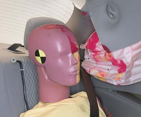 Smeared greasepaint shows where the rear passenger dummya€™s head was protected by the side airbag