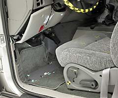 Intrusion into the driver's footwell area contributed to the likelihood of right lower leg injuries