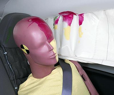 Smeared greasepaint shows where the rear passenger dummy's head was protected by the side airbag