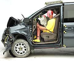 The driver's survival space was maintained reasonably well, as indicated by the dummy's position in relation to the steering wheel and instrument panel after the third crash test