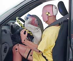 The dummy's head bottomed out the airbag and hit the steering wheel in the first two tests. In the second test (pictured), there also was too much upward movement of the steering wheel