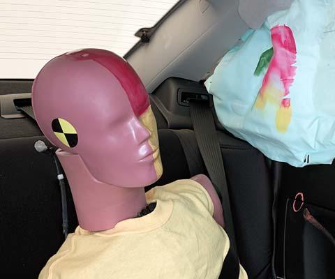 Smeared greasepaint shows where the rear passenger dummy’s head was protected by the side airbag