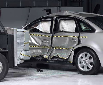 View of the vehicle and barrier just after the crash test.