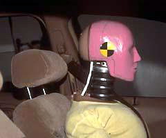 The head restraints are poor. Even when they're adjusted to the highest position, they're too far below and behind the top of an average-size male's head to provide adequate protection