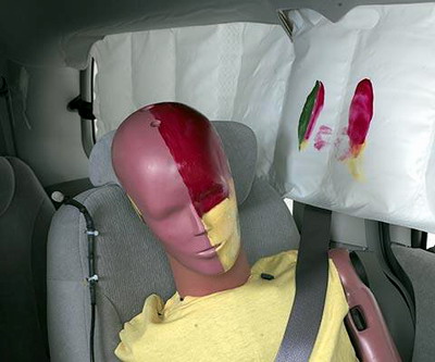 Smeared greasepaint shows where the rear passenger dummy's head was protected by the side airbag.