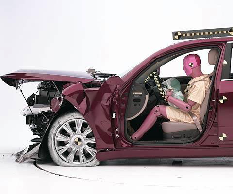 In each test, the dummy's position in relation to the steering wheel and instrument panel after the crash test indicates that the driver's survival space was maintained well (second test shown)