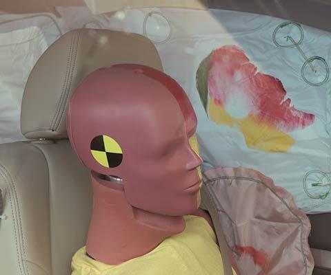 Smeared greasepaint shows where the driver dummy's head was protected from being hit by hard structures by the side curtain airbag (greasepaint from the head contacting the side torso airbag is not readily visible)