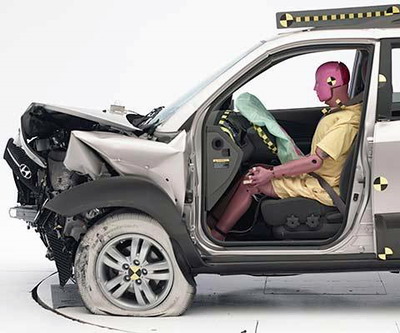 The dummy's position in relation to the steering wheel and instrument panel after the Institute's crash test indicates that the driver's survival space was maintained well