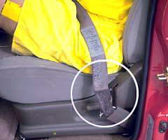 Special lap belt stitching tore, allowing the belt to lengthen and the dummy to move too much