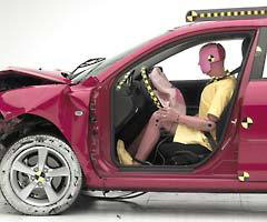 The dummy's position in relation to the steering wheel and instrument panel after the crash test indicates that the driver's survival space was maintained very well