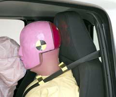 Dummy movement was reasonably well controlled, despite the excessive tipping of the seat. During rebound, the dummy's head hit the head restraint