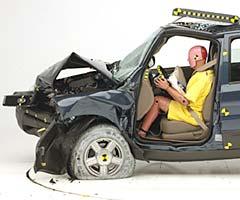 The dummy's position in relation to the steering wheel and instrument panel after the crash test indicates that the driver's survival space was maintained well