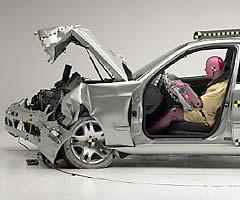 The dummy's position in relation to the steering wheel and instrument panel after the crash test indicates that the driver's survival space was maintained very well