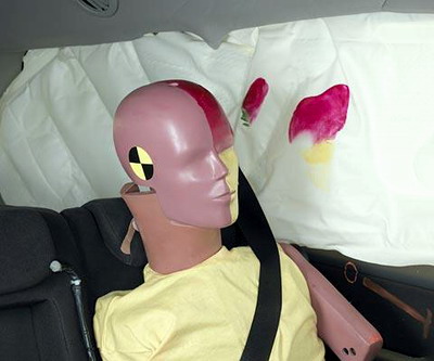 Smeared greasepaint shows where the rear passenger dummy's head was hit by the rear door window glass