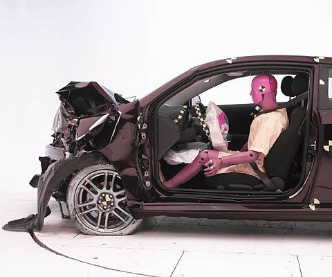 The dummy's position in relation to the steering wheel and instrument panel after the crash test indicates that the driver's survival space was maintained very well