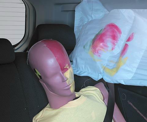 Smeared greasepaint shows where the rear passenger dummy's head was hit by the window glass of the rear passenger door