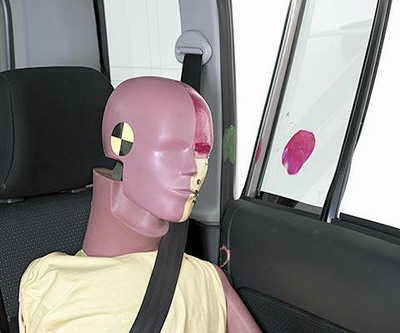 Smeared greasepaint shows where the rear passenger dummy's head was hit by the window glass of the rear passenger door