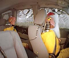 Action shot taken during the side impact crash test showing the driver dummy's head was protected from being hit by hard structures by the side airbag