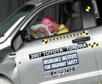 A high head acceleration occurred when the dummy's head hit the steering wheel through the airbag in the Institute's test