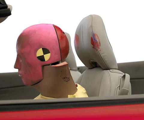 During rebound, the dummy's head hit only the head restraint (and brushed the sunvisor) as indicated by smeared greasepaint