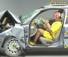 The dummy's position in relation to the steering wheel and instrument panel after the crash test indicates that the driver's survival space was maintained well