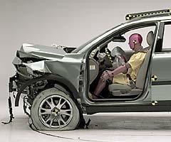 The dummy's position in relation to the steering wheel and instrument panel after the crash test indicates that the driver's survival space was maintained well